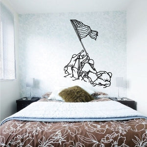 Memorial wall decal with black line art of flag and crouching figures