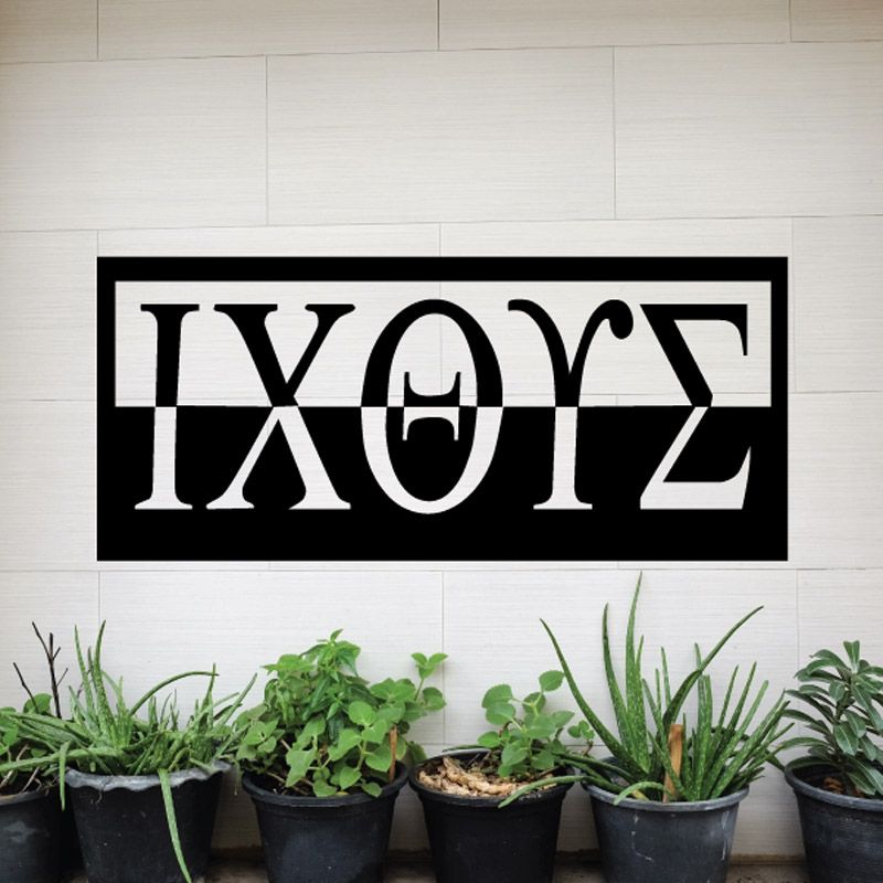 Wall decal with stylized white and black letters on a rectangular frame
