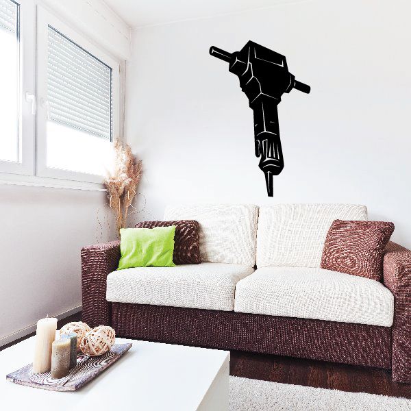 Black jackhammer wall decal with geometric lines and centered pick