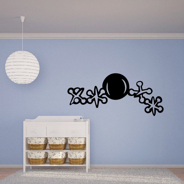 Vinyl wall decal with black spiky circle and star-like motifs for decoration