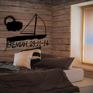 Wall decal in black reading Jeremiah 29:11-14 with decorative shapes
