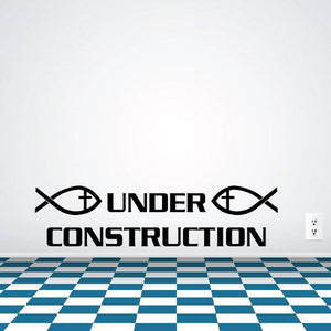Under construction decal with fish symbols, black lettering, blue checkered stripe bottom