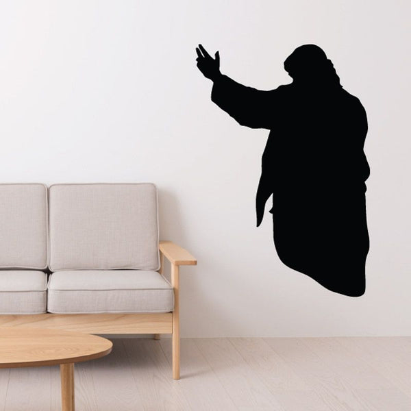 Jesus figure wall decal with one hand raised, black silhouette