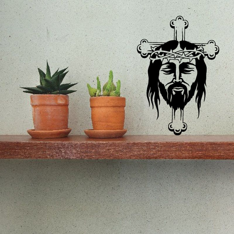 Jesus head decal with cross behind, bold black line art with beard and crown graphic