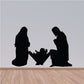 Nativity decal with three kneeling silhouettes and a manger scene
