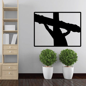 Rectangle wall decal with black cross silhouette and outstretched arms