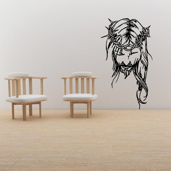 Jesus decal with crown of thorns, eyes closed, black line art.