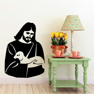 Religious wall decal of Jesus holding a lamb, black silhouette