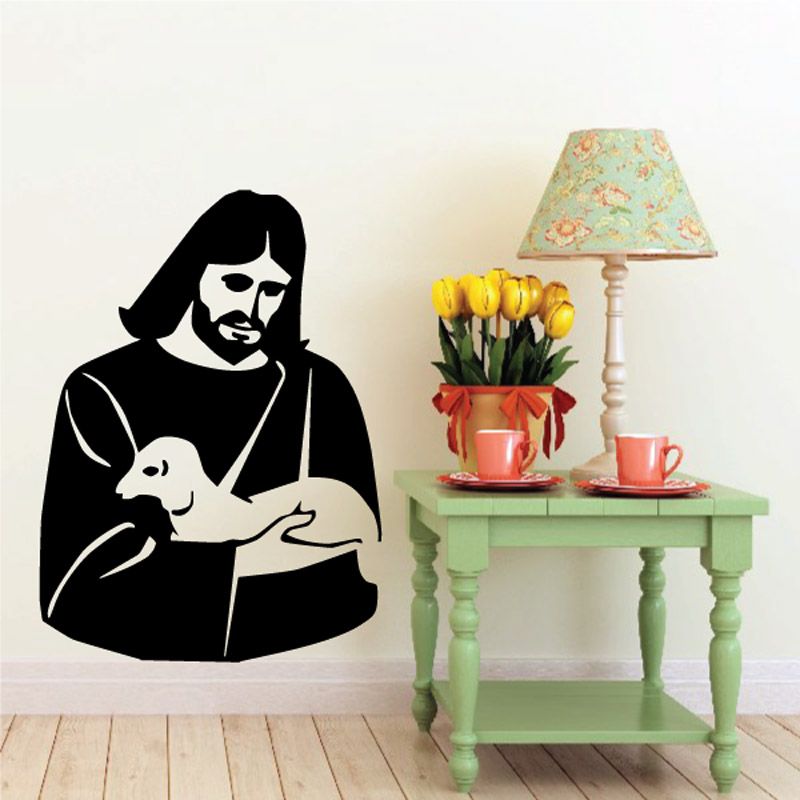 Religious wall decal of Jesus holding a lamb, black silhouette