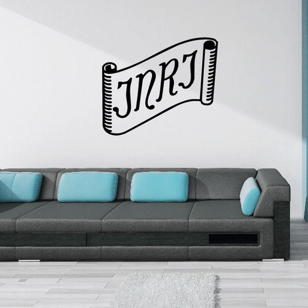 JNRJ scroll decal with black stylized letters and scroll-like outline