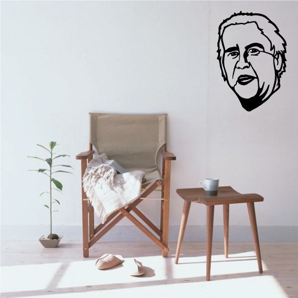 Joe Biden portrait decal with black outline face on light surface