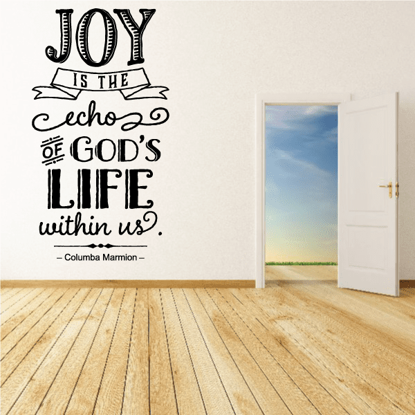 Black wall decal text: "JOY IS THE echo of GOD'S LIFE within us"