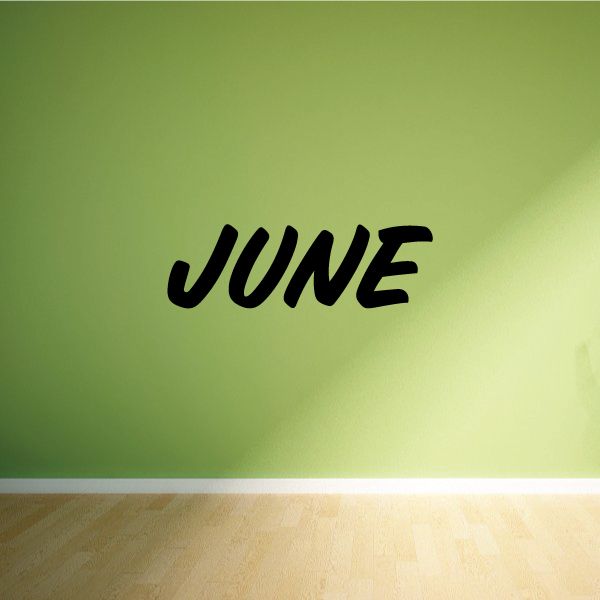 Vinyl wall decal with 'JUNE' in black cursive lettering