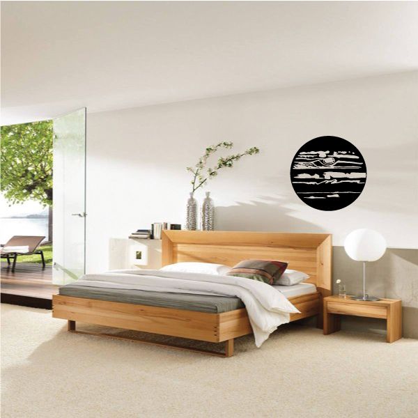 Circular black wall decal with white Jupiter-style stripe planet design