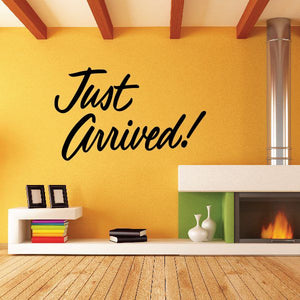 Vinyl wall decal with black cursive text: Just Arrived!