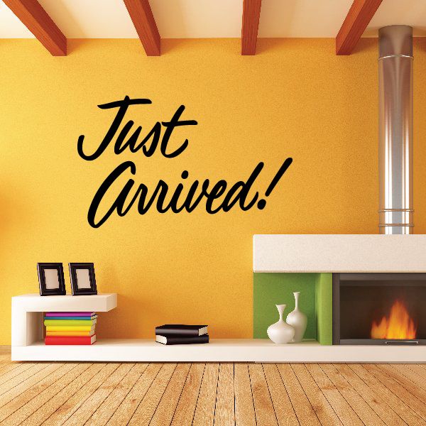 Vinyl wall decal with black cursive text: Just Arrived!
