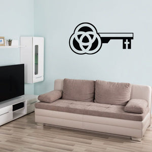 Black key cross wall decal with circular emblem and key silhouette.