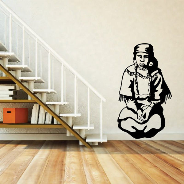 Kneeling Native American woman wall decal with black silhouette sitting cross-legged