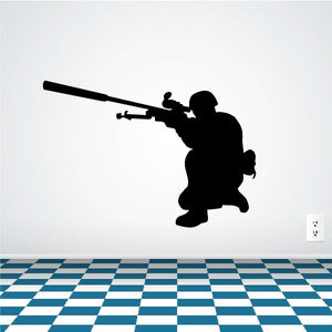 Kneeling sniper aiming decal with black silhouette and rifle scope