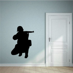 Kneeling soldier aiming rifle wall decal, black silhouette