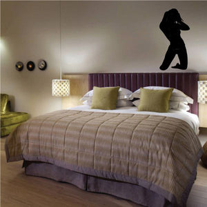 Kneeling woman hair toss silhouette wall decal, black figure