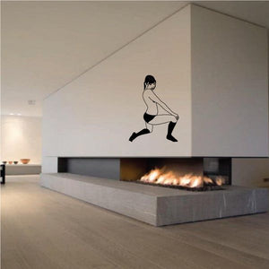 Black silhouette kneeling woman in socks wall decal
