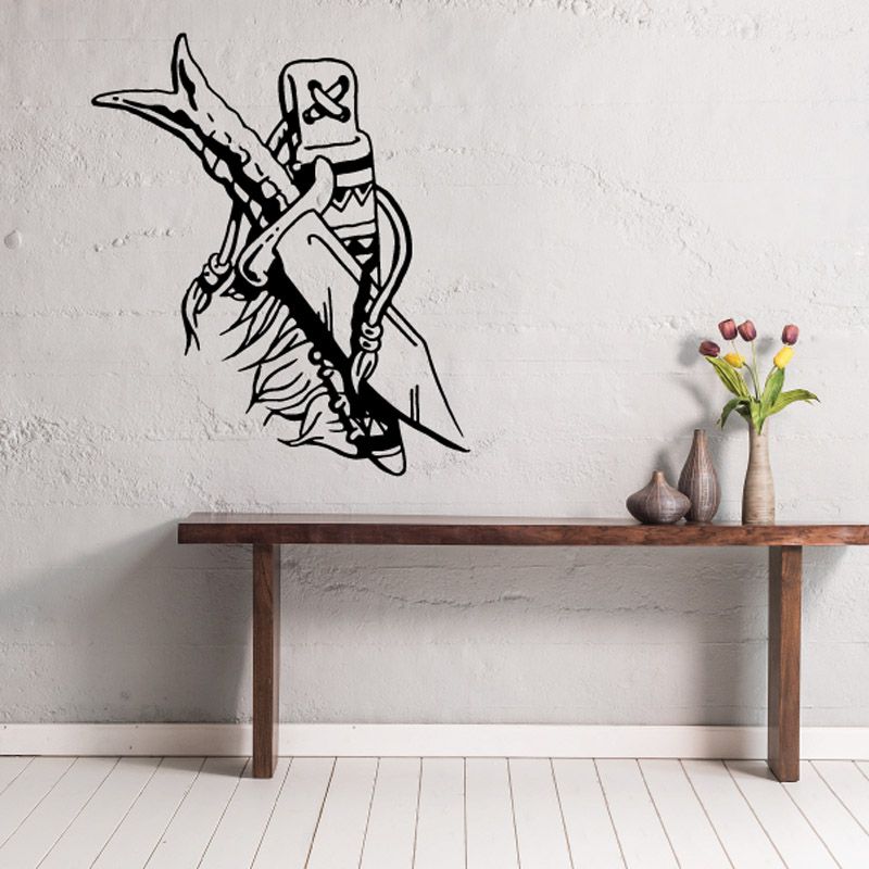 Black wall decal featuring a knife with sheath and a sword-wielding figure