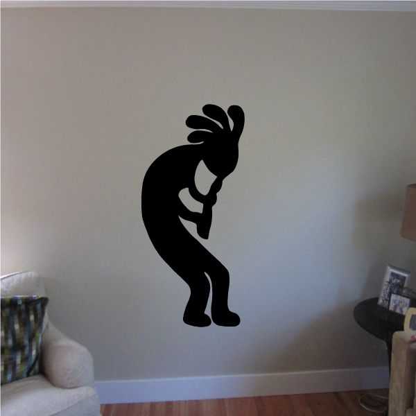 Kokopelli decal: black silhouette of musician holding a flute-like instrument
