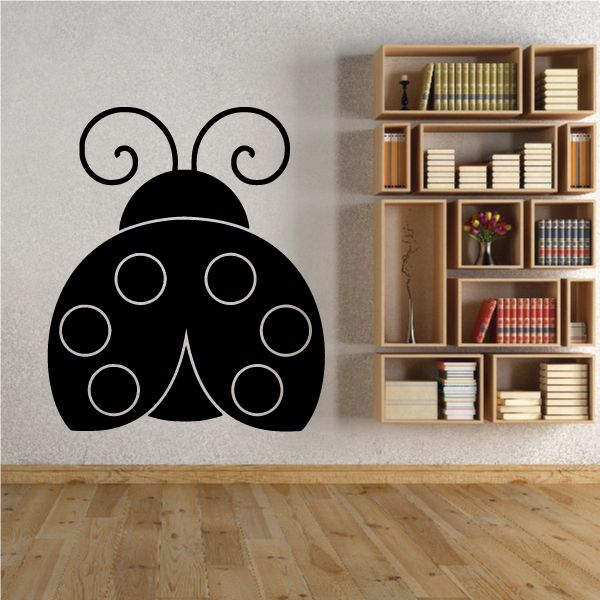 Black ladybug wall decal with white outline and six white spots