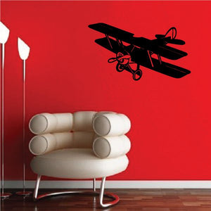 Black biplane wall decal with detailed wings and engine silhouette