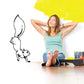 Black outline landing squirrel wall decal with raised paw and long tail