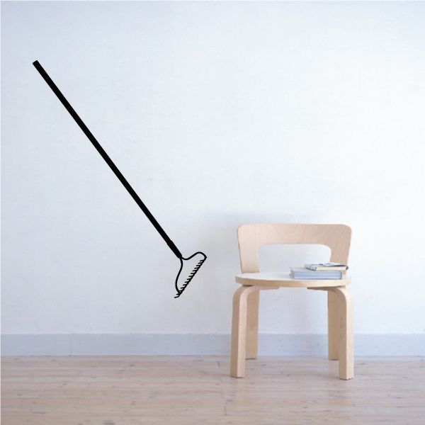 Large black rake wall decal with long handle and curved tines