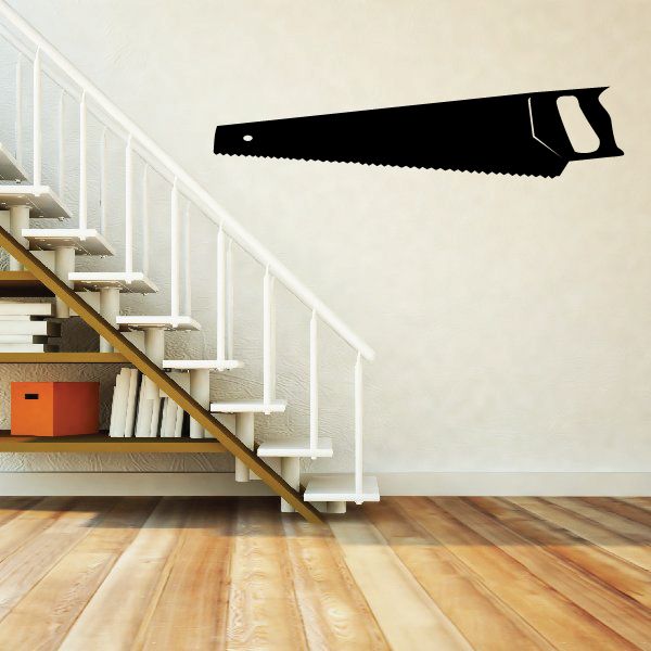 Black hand saw wall decal with serrated blade and wood-grip handle