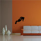 Leaning seahorse wall decal, black silhouette on a plain wall