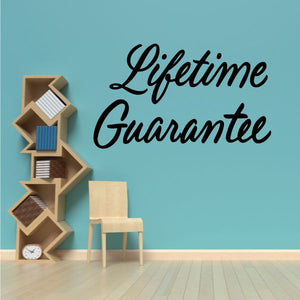 Black “Lifetime Guarantee” vinyl wall decal script lettering