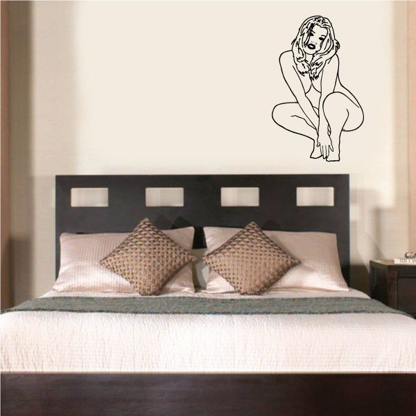 Light-haired crouched nude woman wall decal in black line art