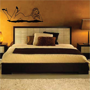 Reclining nude woman wall decal with light hair and high-heel silhouette