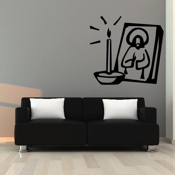 Black wall decal featuring a lit candle and praying figure in circular frame