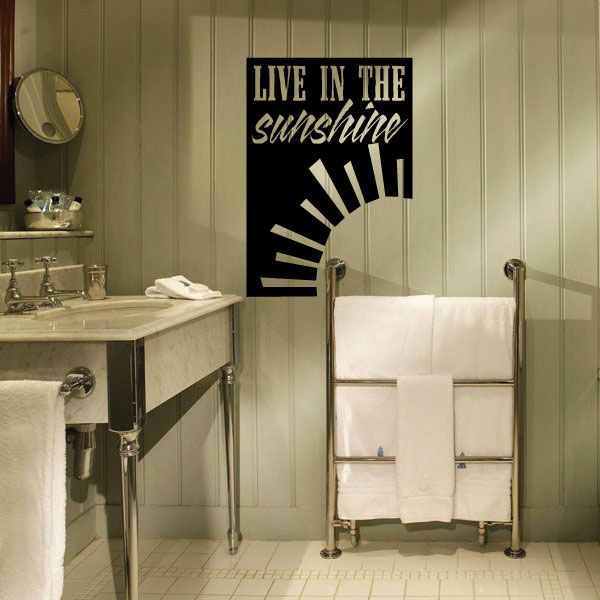 Wall decal: 'LIVE IN THE SUNSHINE' with white sun rays