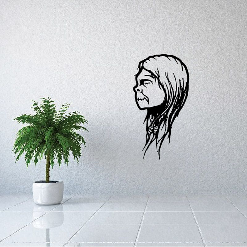 Shrunken head decal with long hair, black and white portrait.