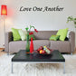 Wall decal with cursive "Love One Another" lettering
