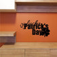 St Patrick's Day decal with Lucky text and clover, black lettering on orange wall