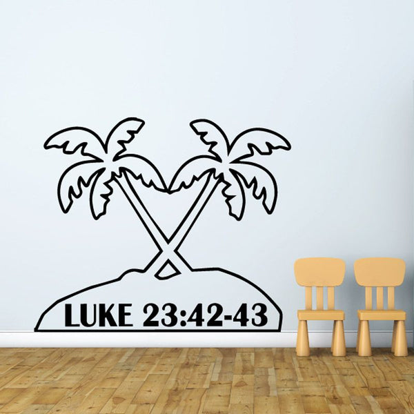 Black palm tree decal with crossed trunks and text 'LUKE 23:42-43'