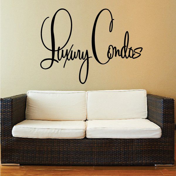 Vinyl wall decal with Luxury Condos script lettering, black