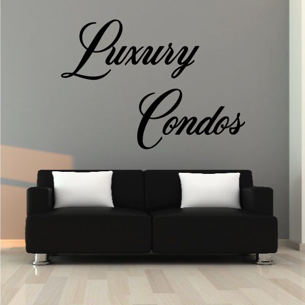 Vinyl wall decal with black cursive 'Luxury Condos' lettering