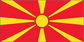North Macedonia flag sticker with red field, yellow sun rays, and central yellow circle