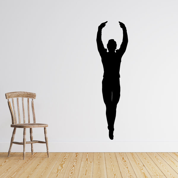 Black silhouette of a male ballet dancer with arms overhead wall decal