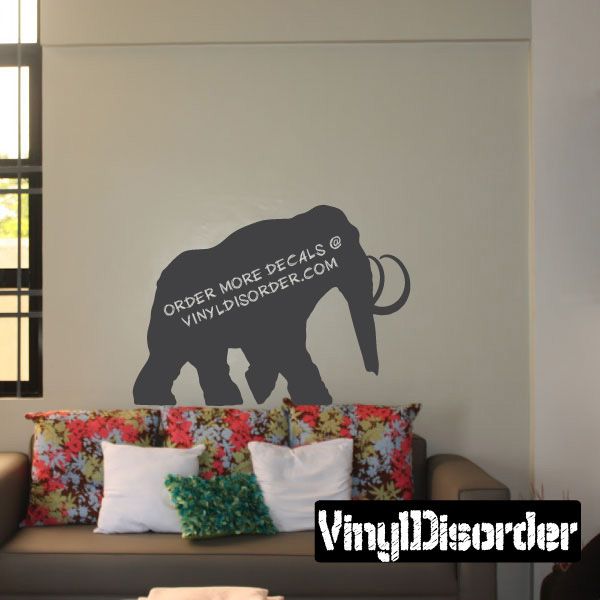 Mammoth chalkboard wall decal with dark silhouette, tusks, and rounded ear