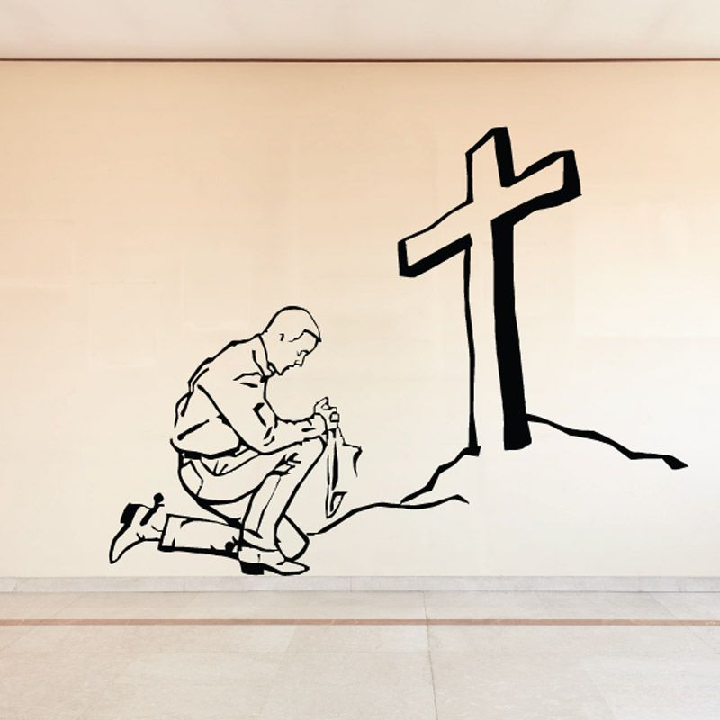 Image of Man Holding Hat Praying to Cross Decal