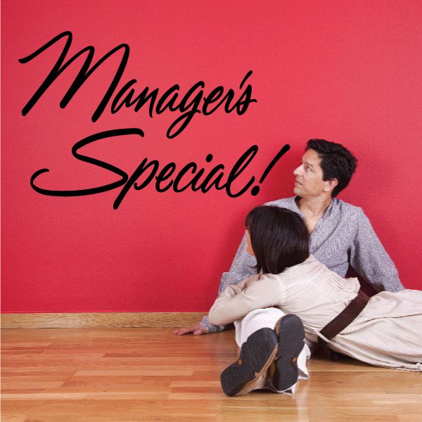 Red wall vinyl decal with script text “Manager's Special!”
